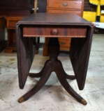 Vintage Federal Style Two-Drawer Mahogany Drop Leaf Table with Metal “Paw” Cap Feet