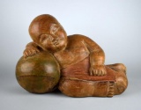 Carved-Wood Reclining Asian Child Figure