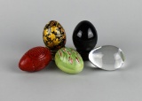 Lot of Five Eggs (Cinnabar, Glass, Porcelain) with Two Stands