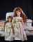 Lot of Four Unique Porcelain Doll Collection Dolls of Vary Sizes: Baby, Daisy, & Sandy