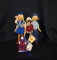 Lot of Four Hand Crafted Wooden Peg Dolls: 2 Polish Peg Dolls, Cillacraft Welsh Doll, & Other
