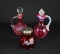 Lot of Three Cranberry & Cranberry Opalescent Glass Serving Pieces: Shaker, Cruets
