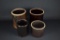 Four Antique Albany Slip Glazed Stoneware Crocks