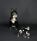 Lot of Four Ceramic Dog Figurines: Black Boxer & Boston Terriers