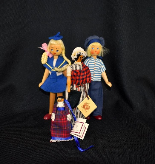 Lot of Four Hand Crafted Wooden Peg Dolls: 2 Polish Peg Dolls, Cillacraft Welsh Doll, & Other