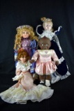 Lot of Four Vinyl & Porcelain Dolls: Cameo “Kewpie”, Ashley Belle, & Others