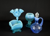 Lot of Four Blue Glass Pieces: Fenton Compote, Footed Rose Bowl, Cruet, Square Bowl