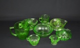 Lot of Eight Vintage Green Glass Kitchen Ware Pieces: Juicers, Pitcher, Bowl, Measuring Cup, Others