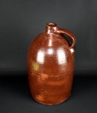 Antique Southern Ovoid Shape Albany Slip Glazed Stoneware Whiskey Jug, Repair to Handle/Rim