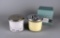 Lot of Two Canister Candles: White Bard “Orchard Blossom” & Mariposa “At Home”