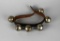 Six Sleigh Bells Mounted on Leather Strap