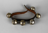 Six Sleigh Bells Mounted on Leather Strap