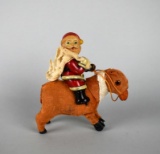Antique Santa Claus Riding a Reindeer Windup Toy