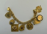 Vintage 14K Gold Charm 7.25” Bracelet with Eight 14K Charms