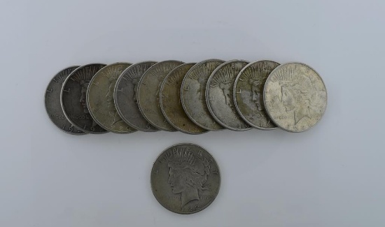 Eleven Circ. Silver Peace Dollars: 1922D (3), 1922 S (5), 1923S, 1926S & 1927S