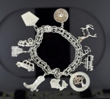 Vintage Sterling Silver 7.25” Charm Bracelet with 11 Sterling Charms