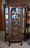 Antique Turn of 20th C. Five-Shelf Oak Curio Cabinet, Paw Feet, Mirrored Back