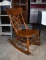 Antique Oak Spindle Back Rocking Chair, Pressed Dolphin Design in Top Rail