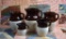 Lot of Five Graduated Brown & White Stoneware Pitchers: Robinson Ransbottom Pottery & Unmarked