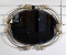 Vintage Oval Mirror with Open Scrolling Gilt Metal Frame
