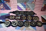 Fifteen Old British Horse Brasses Mounted on Leather Straps