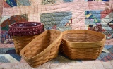 Three Longaberger Baskets: 1999 Hexagonal Basket, 1997 Swing Basket, & Sleigh Basket