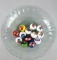 Lot of Thirteen Soda Themed Marbles & Three Marble Stands in Glass Coca-Cola Bowl
