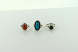 Lot of Three 800 or Sterling Silver Rings with Turquoise, Red Coral, or Green Onyx Stones