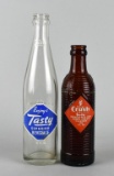 Two Vintage Soda Bottles: Tasty & Orange Crush