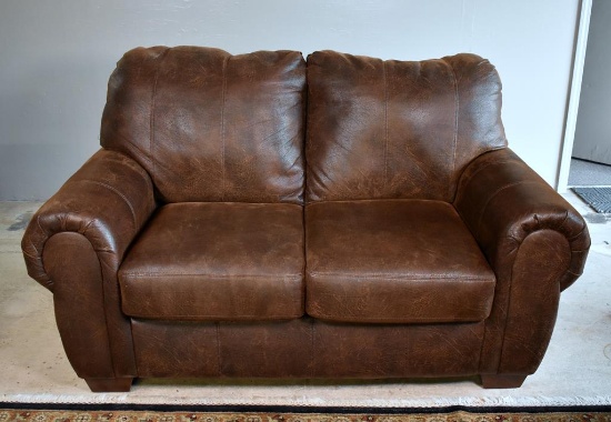Ashley Furniture Industries, Inc. Brown Faux Leather Love Seat