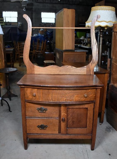Early 20th C. Tiger Oak Bowfront Washstand with Towel Harp
