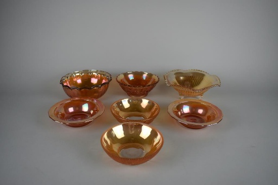 Lot of Seven Small Marigold Carnival Glass Bowls of Various Patterns & Makers
