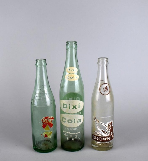 Three Vintage Glass Soda Bottles: Royal Crown, Dixi Cola & Brownie