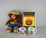 Lot of Smokey the Bear Items: Plush Toy, Two Glass Mugs, & Porcelain Ande Rooney Sign