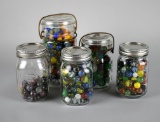 Lot of Five Jars of Mostly Cats Eye Glass Marbles Including Shooters