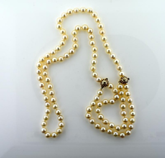 Fine Pearl 34” Necklace with Two Gold Doubling Clasps