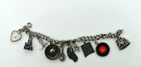 Vintage Mid-Century Teen's Sterling Silver Charm Bracelet with Ten Charms