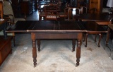 Antique Oak Pub Table on Caster Feet with Extension Leaves on Each End