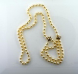 Fine Pearl 34” Necklace with Two Gold Doubling Clasps