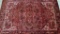 Ghandi Fine Persian Hand Knotted Heriz Wool  7' 10” x 10' 10