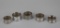 Five Antique Sterling Silver Napkin Rings of Different Designs