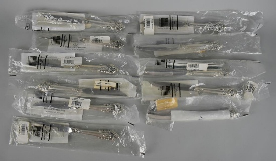 Eleven Wallace Silversmiths “Grand Baroque” Sterling Silver Handle Steak Knives