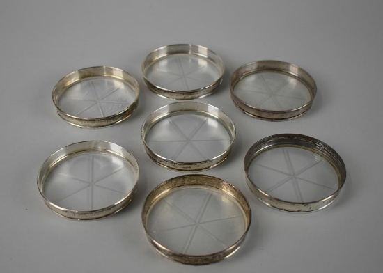 Lot of Seven Sterling Silver Rimmed Glass Coasters