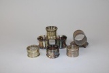 Lot of Seven Silver Plated Napkin Rings: James Tufts & Others