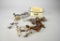 Lot of Duck Hunting Memorabilia: Basket, Whistles on Lanyards, Leg Bands, & Figurines