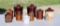 Lot of Vintage Food Crocks: Seven with Wire & Bails, Vermont Syrup Jug, & Other