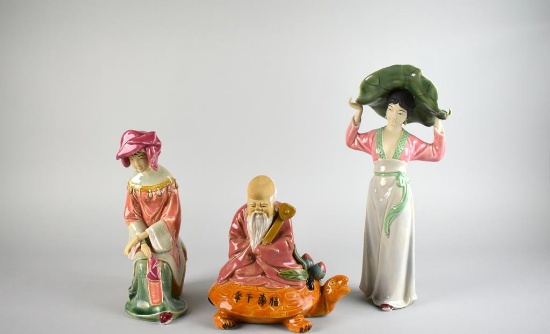 Lot of Three Oriental Figurines: Old Man on Turtle, Woman with Hat, & Seated Woman Looking Down