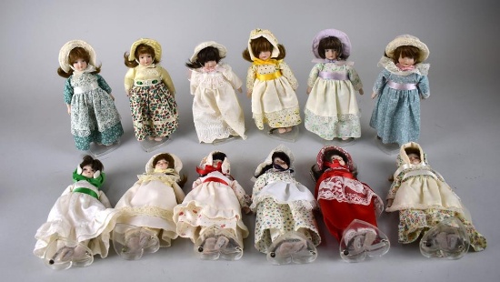 Lot of Twelve Gorham Dolls of the Month on Standard Stands