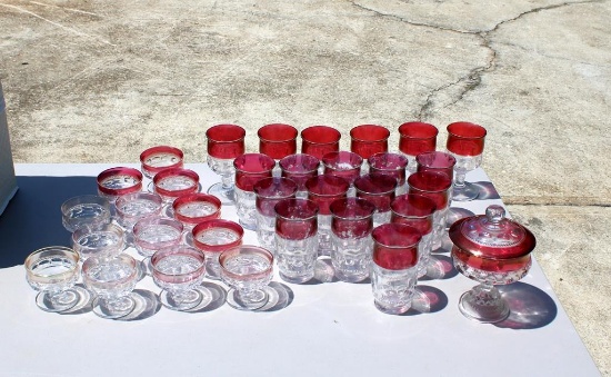 Lot of 33 Pieces Cranberry Flashed King's Crown Glassware and Storage Box