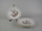 Set of Four Reticulated Porcelain Floral Design Plates with Gilt Scalloped Edge
